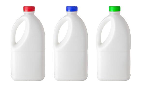 White plastic milk jugs with colorful caps
