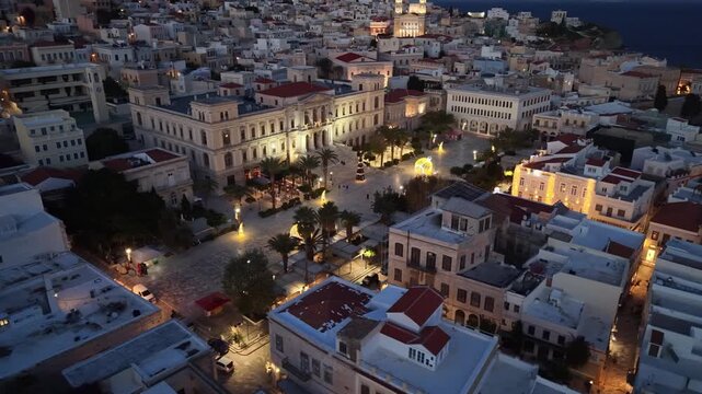 Aerial Pan of Miaouli Square and Town Hall at Dusk, Syros-Ermoupoli