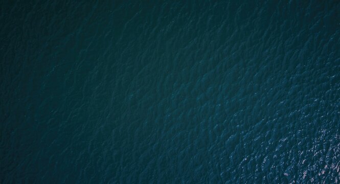 Sky high drone imagery centering on water details