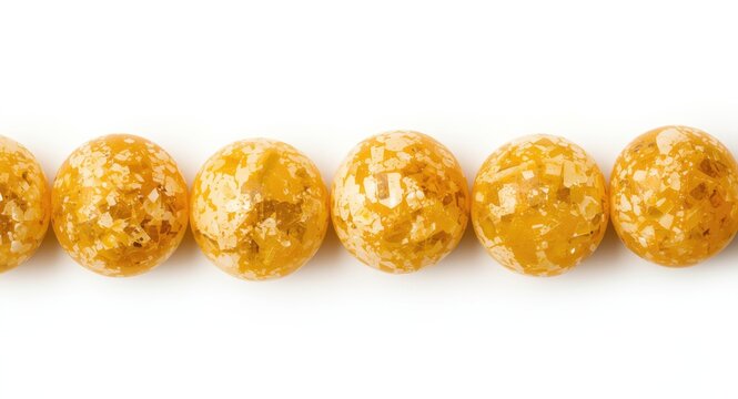 Isolated mastic resin beads displayed on a pure white backdrop