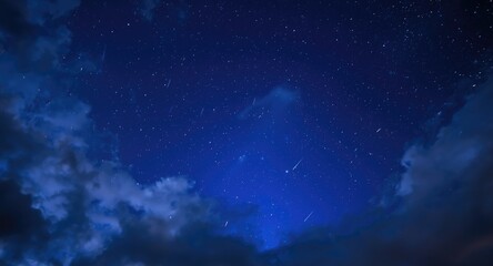 Fototapeta premium Shimmering night atmosphere displaying a vibrant royal blue background and multiple shooting stars among clouds