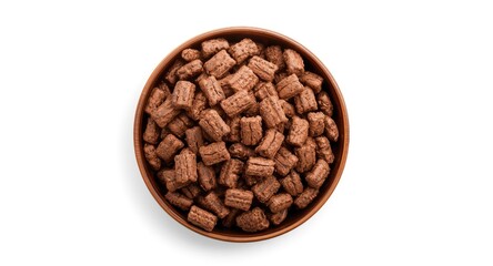 Fototapeta premium Rustic bowl filled with chocolate cereal pads against white background