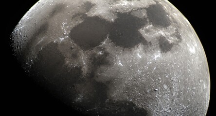 Fototapeta premium Full moon close-up image capturing lunar surface textures and crater depth against a black sky for educational study