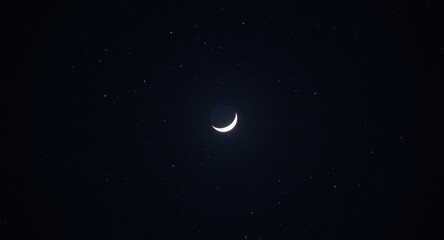 Fototapeta premium Moon eclipsing under a starry nighttime sky
