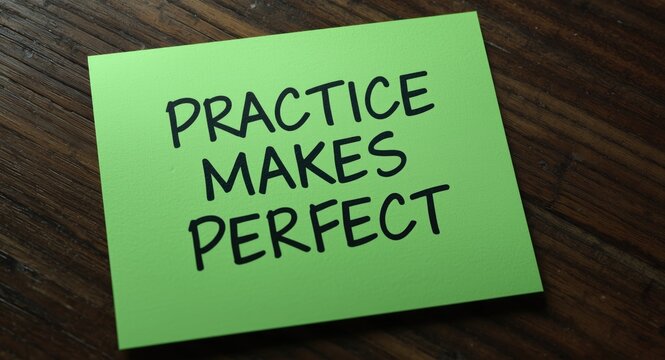 Motivational reminder Practice makes perfect on green sticky note