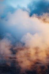 Fototapeta premium Geothermal hot springs resort, spa, bath pool, relaxation vacation theme. A serene scene of steam rising from the ground against a backdrop of a sky filled with clouds illuminated by the setting sun.