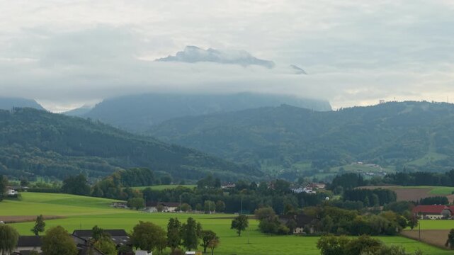 Traunstein mountain panorama with clouds in Laakirchen, Upper Austria