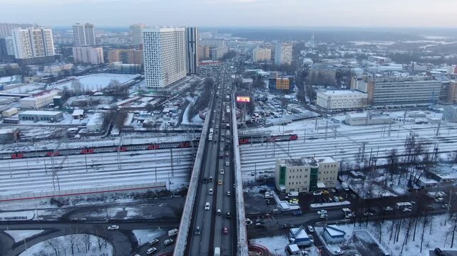 Drone flying above highway bridge