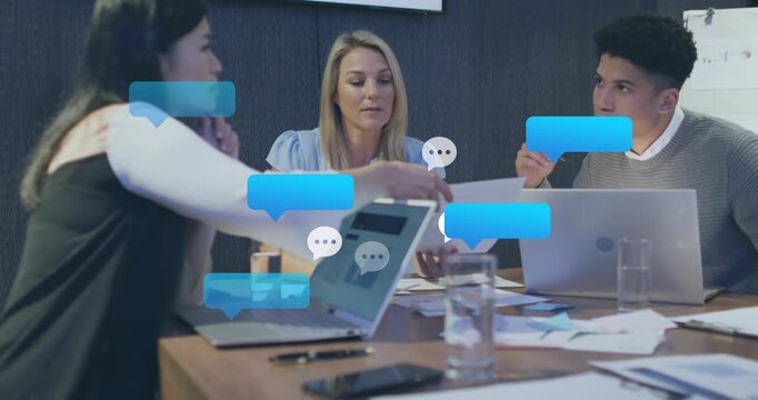 Animation of speech bubbles icons over diverse business people