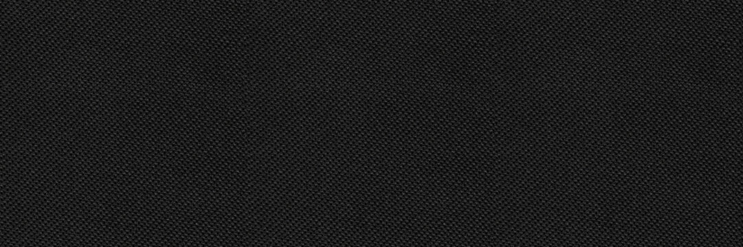 Black canvas fabric seamless background texture. Dark textile cloth used for shoes, clothing, bags and furniture material.