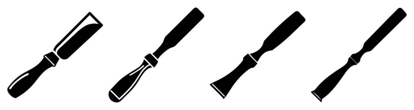 Set of four black metal chisels isolated on white background for woodworking and crafting tools