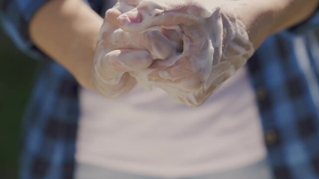 wash hands with soap close-up, foam the gel to remove dirt, cleanse the pores of the skin from viros microbes, healthcare, follow a healthy lifestyle, coronavirus, hand care with disinfectants.