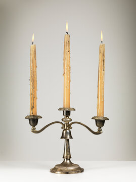 Antique Candle Holder with burning candles
