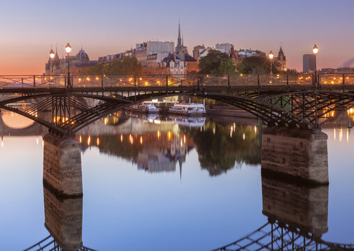 Pont des Arts and Ile de la Cite on Seine River at dawn in Paris, France