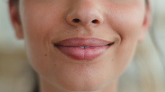 Close up lips mouth Indian Arabian woman smiling natural lipstick beauty makeup cosmetology ethnic female sensual feminine health medicine unrecognizable girl indoor lifestyle skincare aesthetic smile