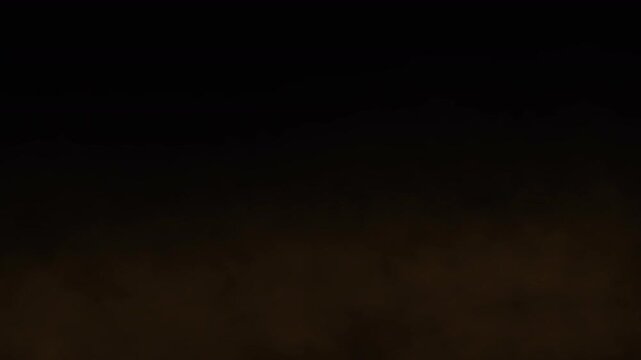 Brown sand dust on slow moving black screen background. Soil powder smoke effect. Sandstorm, mist vapor smog moving to right, sand soil overlay motion graphic. Seamless looping video 4K
