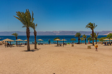 Obraz premium AQABA, JORDAN - JULY 14, 2022: South Beach in Aqaba, Jordan