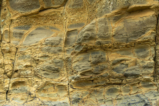 Detailed Geological Rock Formation with Boxwork Weathering and Volcanic Tuff Layers on Contadora Island Pearl Islands Panama