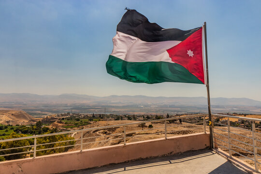 Flag of Jordan at ancient Pella ruins, Jordan