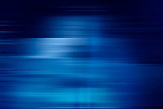 digitally generated image of blue light and stripes moving fast, blue technology abstract motion background of speed light