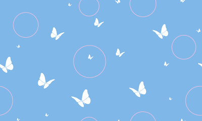 Fototapeta premium Seamless pattern with white butterfly silhouettes and pink circles on a blue background. Vector background for textile, wallpaper, wrapping paper, greeting cards and decor.