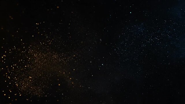 Glowing particles in dark space.