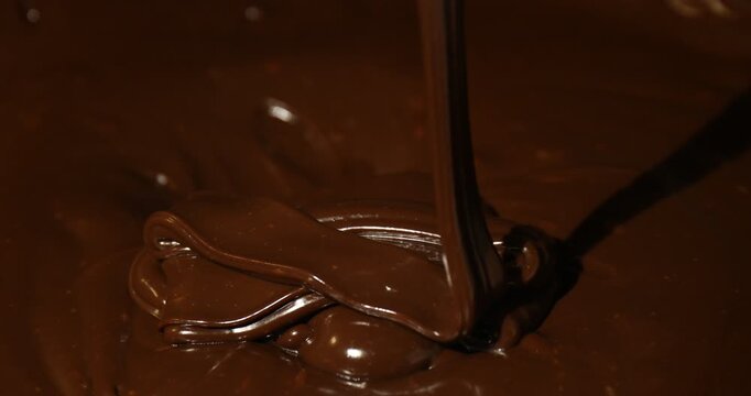 Closeup view of flowing delicious melted chocolate