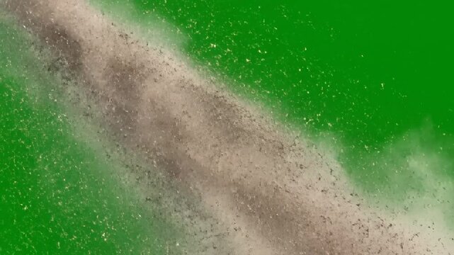 Dramatic Sandstorm Effect Blowing Dust Particles Over Green Screen Chroma Key Background For Visual Effects And Compositing