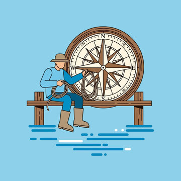 Man Holding Rope Next To Large Nautical Compass On Dock