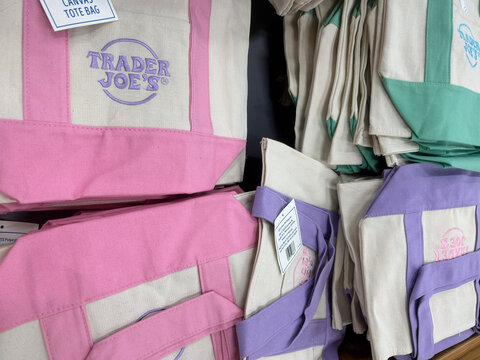Santa Rosa, California - March 2026, Photograph of Mini Pastel tote bags for sale at Trader Joe's. 