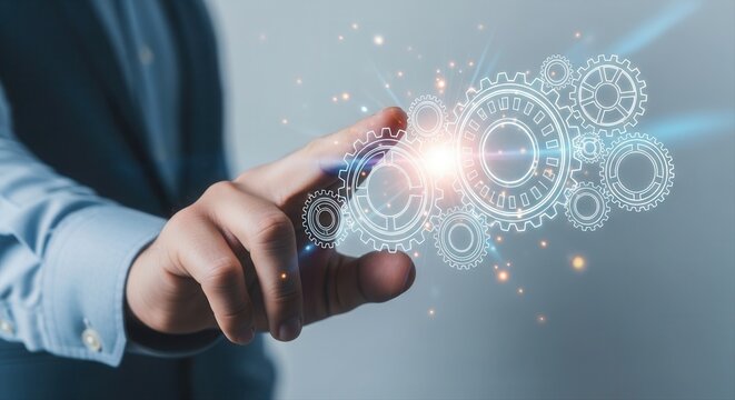 A hand interacts with a holographic gear system for industrial automation, automation, system, process, technology, digital, software, business