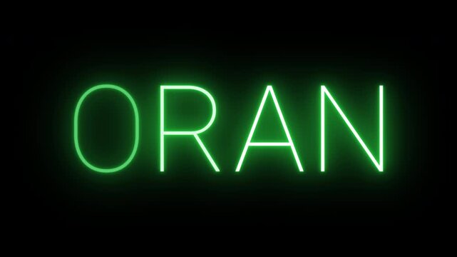 Flickering neon green glowing oran sign animated on black background.