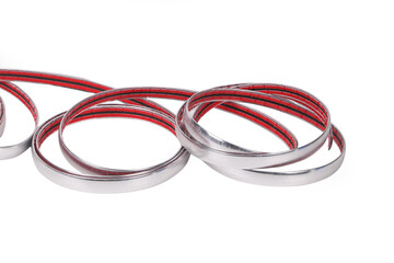 Naklejka premium A Roll of Silver Edge Binding Tape on White Background