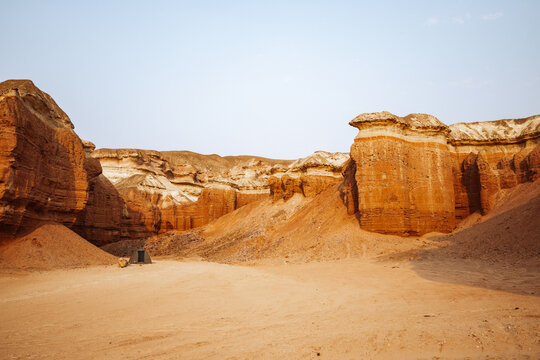 Close-up of red rock formations and eroded pillars in Colinas Canyon, southern Angola &ndash; textured geological structures