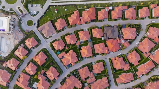 Directly Above Drone View of Planned Suburban Cottages with Curved Roads and Roundabouts in gated Ordo Community, South Bishkek, Kyrgyzstan