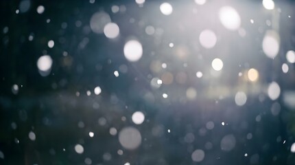 Obraz premium Abstract Soft Focus White Bokeh Lights Falling Against a Dark Blue Background with Atmospheric Glow