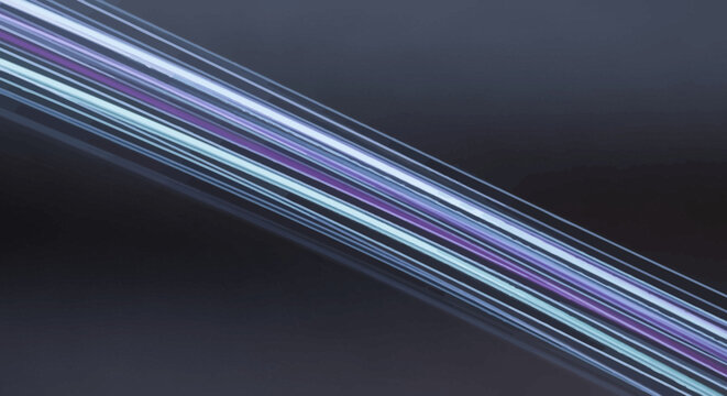Abstract background of glowing fiber optic strands in purple and blue hues