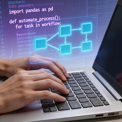 Obraz premium A person types on a laptop, with programming code and a workflow diagram displayed. Represents tech, software development, and automation in business.