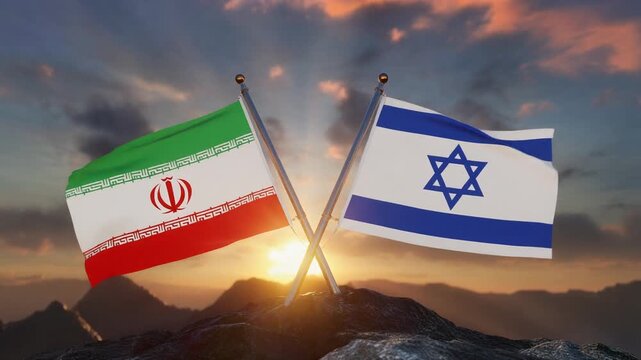 Two national flags&mdash;Iran and Israel&mdash;are mounted on crossing flagpoles at the peak of a mountain. The Iranian flag displays green, white, and red stripes with its emblem in the center, while the Israeli