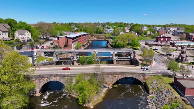 Main Street Bridge and Woonsocket Falls Dam on Blackstone River aerial view in downtown Woonsocket, Rhode Island RI, USA.