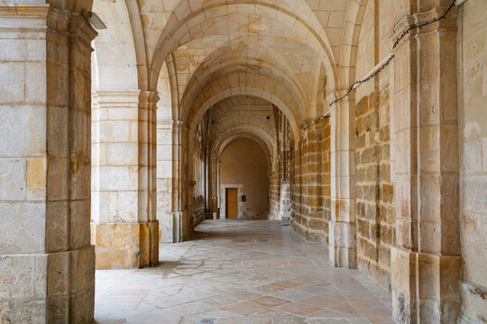 Historic stone cloister and vaulted hallway of Saint-Germain Abbey in Auxerre, Burgundy, France