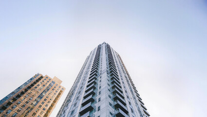 Fototapeta premium Low Angle View of Modern Skyscraper Against Clear Sky