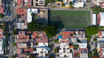 Football soccer field nestled among the houses of the neighborhood © Felipe