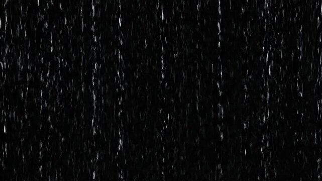 A dark textured pattern of rain drops falling against a black night sky creates a grunge galaxy surface with light dust and cold winter stars