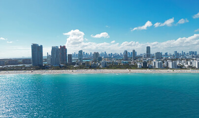 Naklejka premium Miami seaside with turquoise ocean and sky. Miami city. Famous oceanfront of Miami. Miami Beach skyline.