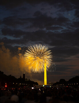 July fourth Washington dc celebration. July 4 fireworks patriotic independence event. July bright sky explosion display. July people holiday gathering.