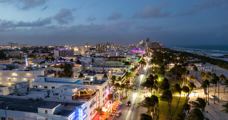 Obraz premium Summer holiday with Ocean Drive vibes on Miami at evening. Miami city with Ocean Drive at evening. Panoramic Miami evening coastline with Ocean Drive. Miami shoreline on Ocean Drive.