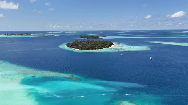 Tropical Island with Palm Trees and Turquoise Lagoon Maldives Aerial drone