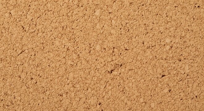Brown corkboard texture background closeup.