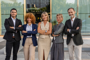 Fototapeta premium Diverse business team smiling with arms crossed